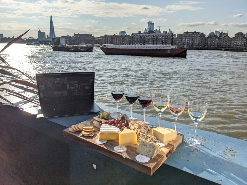 Virtual wine and cheese set up with the Thames in the background
